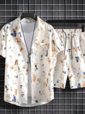 Ensemble chemise et short blanc à fleurs bleu et orange