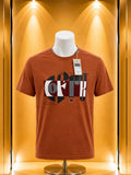 T-shirt orange brique imprimé graphique