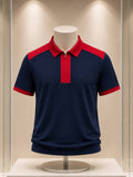 Polo bleu marine et rouge à col zippé