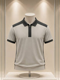 Polo gris clair et anthracite à col zippé